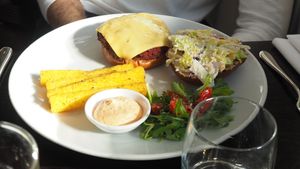 Beetroot Cheese Burger – Pretzel bun, smoked tomato relish & raw vegetable salad with wholegrain mustard & maple dressing with vegan cheese - Part of £22.50 3 Course Set at The Gate - Islington in London