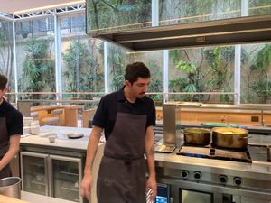 The seats surround the "kitchen," so you can see as they make the food. at MARTi in San Miguel De Tucuman