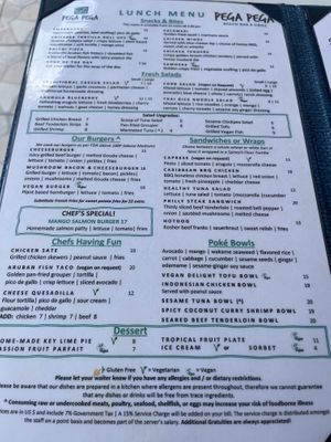 Vegan options clearly marked on menu  at Pega Pega Beach Bar and Grill in Oranjestad