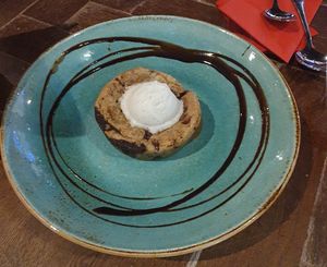 CHOCOLATE CHIP LAVA COOKIE Served with vegan vanilla ice cream at TGI Fridays in Bolton