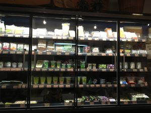 Lil shop with vegan cheese, sausages, tofu etc but dairy too at Woki Organic Market and Restaurant in Barcelona