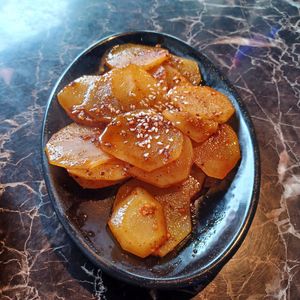Spicy potato medallions at Dan Dan Noodle in Vancouver
