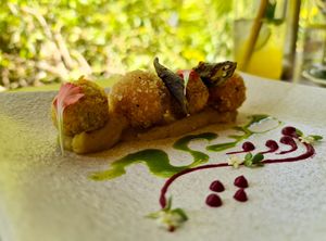 Butternut balls fried in panko with basil and beetroot dressing. at Embark in Nairobi