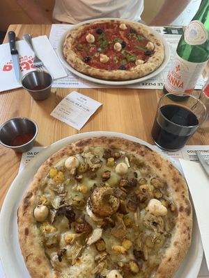 Artichoke Pizza (bottom) sooooo good!!  at Pit'sa in Bergamo