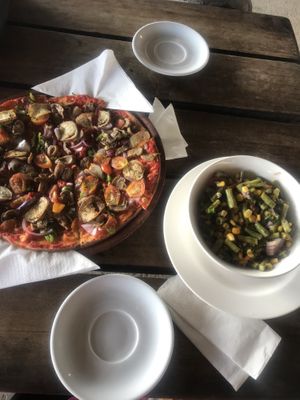 Great vegan meals - the hummus vege wrap is great or a cheese free pizza and side salads   at Nambawan Café in Port Vila