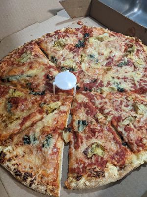 Basil and artichoke pizza with vegan cheese at Glass Nickel Pizza Co in Appleton