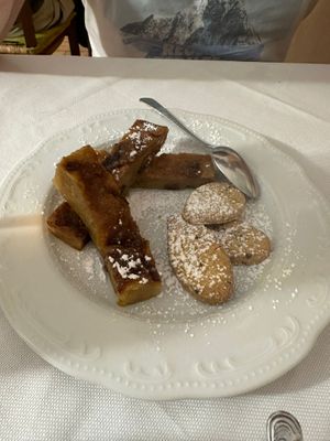Bostrengo senza crema con biscotti at La Trattoria del Leone' di Lucarini Mauro in Urbino