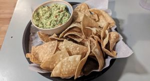 Fire roasted salsa, guacamole and chips. Also had their veggie burrito w/o cheese or sour cream. Also rice and refried beans are supposedly vegan but I did not have    at The Mexican at Central Gastropub in Central