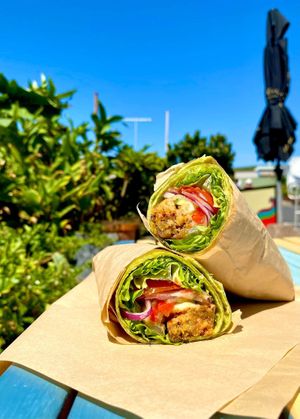 Falafel Wrap (vegan)
-Grilled Falafel
-Tomato
-Cucumber
-Roasted Capsicum
-Greens
-Red Onion
-Pickle
-Houmous &
-Tomato Relish
On Spinach, Multigrain, White or G/F Wrap   at The Green Galley in Coffs Harbour