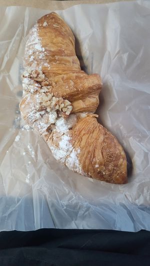 Croissant with cream, almonds and powdered sugar at Craft Vegan Bakery Botánico in Buenos Aires