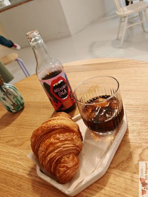 Croissant and cola at Krafin in Prague