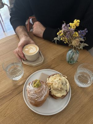 Cappuccino, Krafin with pistachio and cinnamon roll with almond cream   at Krafin in Prague