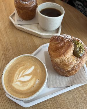 pistachio „krafin“ and an oat flat white   at Krafin in Prague
