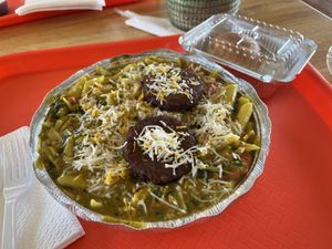 Vegan curry pasta with sausage and cheese, also had potatoes and carrots  at Bala's Bistro in Memphis