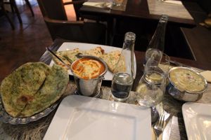 left to right: roti methi, potato naan, dahl, panir methi at Rain by India Curry in Warsaw
