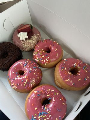 Raspberry Sprinkle, Blackout Chocolate Cake, and Strawberry Rhubarb Pie at Revolution Doughnuts in Decatur