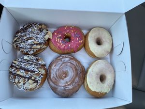 Almond Joy, Cinnamon Roll, Lemon Lavender, and Raspberry Sprinkle  at Revolution Doughnuts in Decatur
