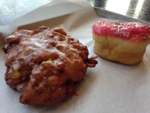 Apple fritter and raspberry sprinkle at Revolution Doughnuts in Decatur