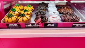 Daily vegan options and the month special(pumpkin buttercream filled)  at Pinkbox Doughnuts in St George