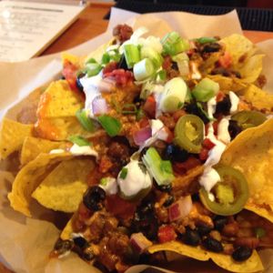 huge plate of nachos at Pig Minds Brewing in Machesney Park
