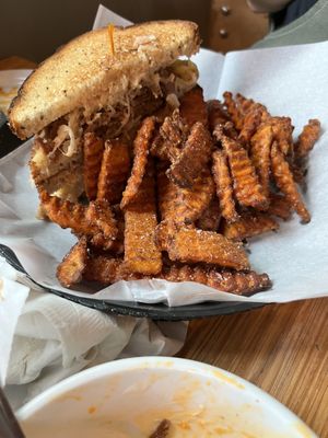 Reuben and sweet potato fries   at Pig Minds Brewing in Machesney Park