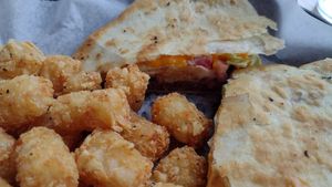 Quesadilla Burger with Tots at Pig Minds Brewing in Machesney Park