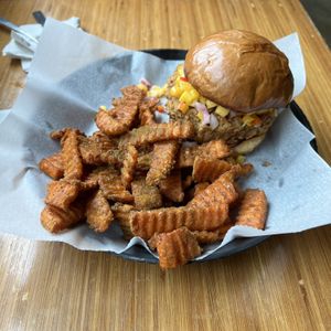 mango habanero chickn sandwich w curry sweet potato fries  at Pig Minds Brewing in Machesney Park