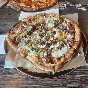 birria pizza at Pig Minds Brewing in Machesney Park