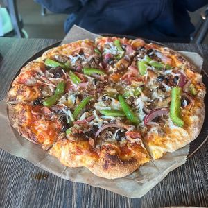 supreme pizza at Pig Minds Brewing in Machesney Park