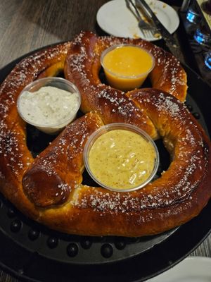 Pretzel with mustard, ranch, and cheese sauce at Pig Minds Brewing in Machesney Park