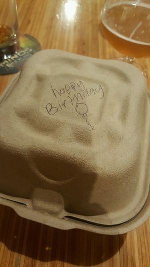 Birthday cake to go! Thank you, Hannah! at Pig Minds Brewing in Machesney Park