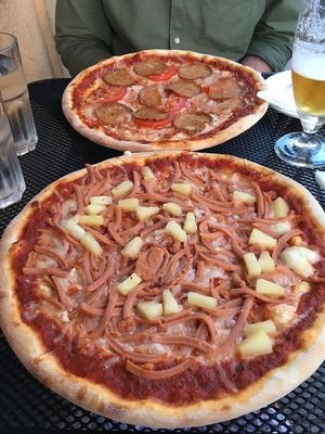 Hawaiin vegan pizza; salami vegan pizza at O'Mamma Mia in Stockholm