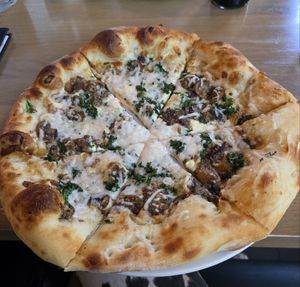 Vegan Kale and mushroom pizza at Earls Kitchen + Bar - Test Kitchen in Vancouver
