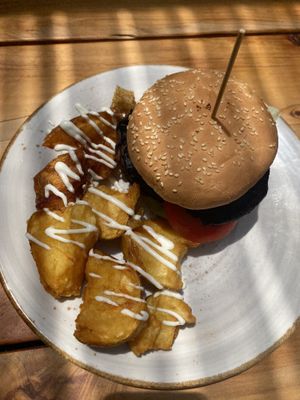 Portobello balsamic burger with potatoes   at Peekaboo Backyard Eatery in Kaitaia