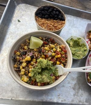 Quinoa avocado salad and beans and rice on the side    at The Grey Eagle Taqueria in Hot Springs