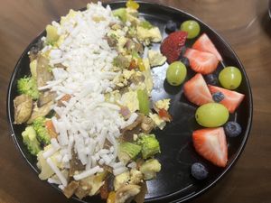 Vegan tofu scramble (Daiya cheese and earthbalance butter) and fruit  at A Lo Natural in Ponce