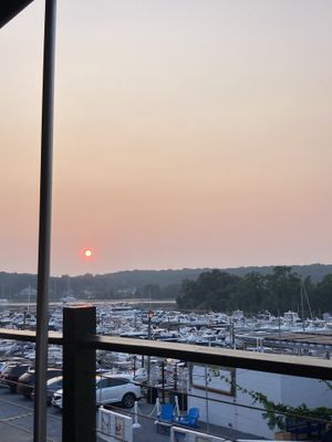 The view from the back patio at sunset at The Purple Elephant in Northport