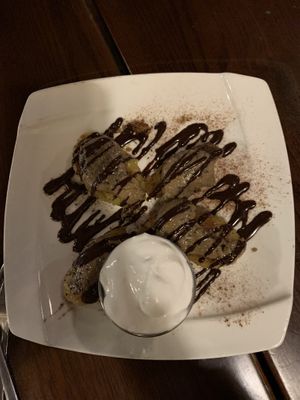 Plantain with seed butter, chocolate drizzle, and coco whip  at The Purple Elephant in Northport