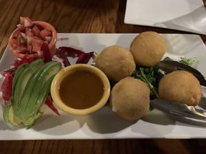 Vegan cheddar potato croquettes... sooo good at The Purple Elephant in Northport