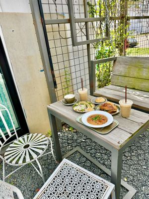 Bean stew with corn bread, harvest panini, coconut passion fruit pastry, tacos, lattes, chai. All were delicious    at The Doshi House Cafe in Houston