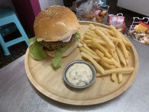 Amazing Vegan Kitchari burger with delicious French fries and vegan mayo. This is a real winner 🙃   at The Dreaming Tree in Phuket