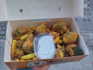 Breaded broccoli with vegan mayonnaise at Cartofisserie in Bucharest