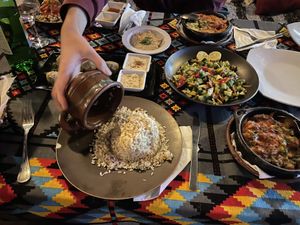 Vegan Moussaka, Lentil Kofta, Tahini sauce, fresh pita, salad, and rice    at Thebes Bar And Grill in Luxor