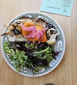 Vegan Hollandaise & Veggies on Toast with Cashew Spread and Fermented Onions.  at Nourish Kitchen & Cafe in Victoria