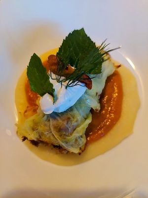 Savoy cabbage wrapped with oyster mushrooms, OMG, plus decadent sauces at Miss Rachel's Pantry in Philadelphia