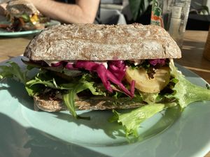 Sandwich with potatoes, red cabbage, parsley pesto and dressing with herbs - so tasty 😋  at The Break Cafe in Thisted