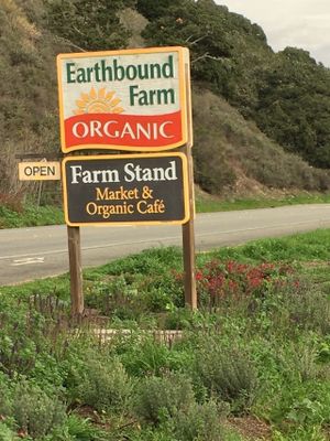 Entrance sign at Earthbound Farm Stand and Cafe at Earthbound Farm Stand and Cafe in Carmel