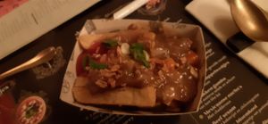 Fries with peanut sauce, ketchup and onion at 't Zusje in Helmond