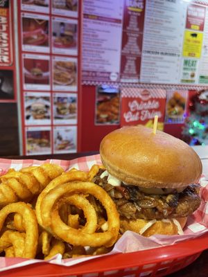 Burger with curly fries   at Big Daddy's Burger Bar in Redfern