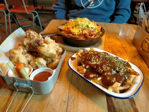 Nachos, cauliflower bites and poutine at The World Bar and Resturant in Queenstown